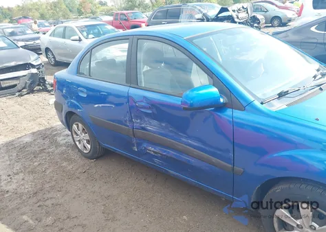 2009 Kia Rio Lx z USA, uszkodzony, nr VIN KNADE223296515210